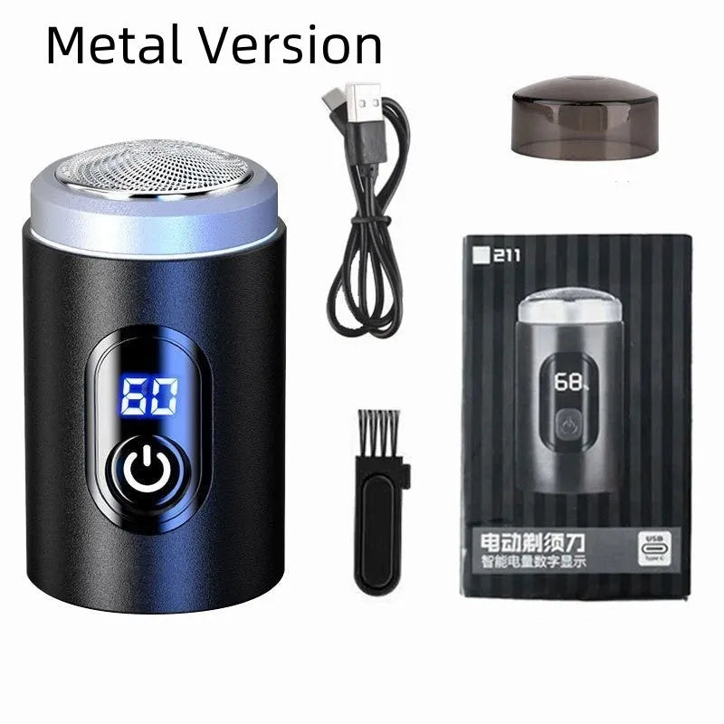 Black mini portable rechargeable shaver with USB cable and cleaning brush on a white background