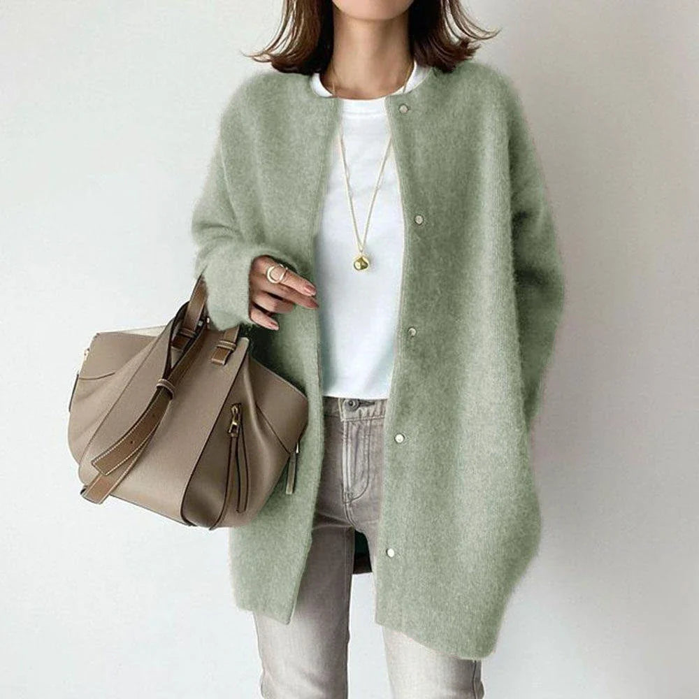 A cozy, knitted cardigan jacket in a variety of colors and sizes, featuring a relaxed open-front silhouette and premium construction for versatile layering.
