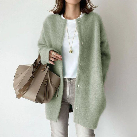 A cozy, knitted cardigan jacket in a variety of colors and sizes, featuring a relaxed open-front silhouette and premium construction for versatile layering.
