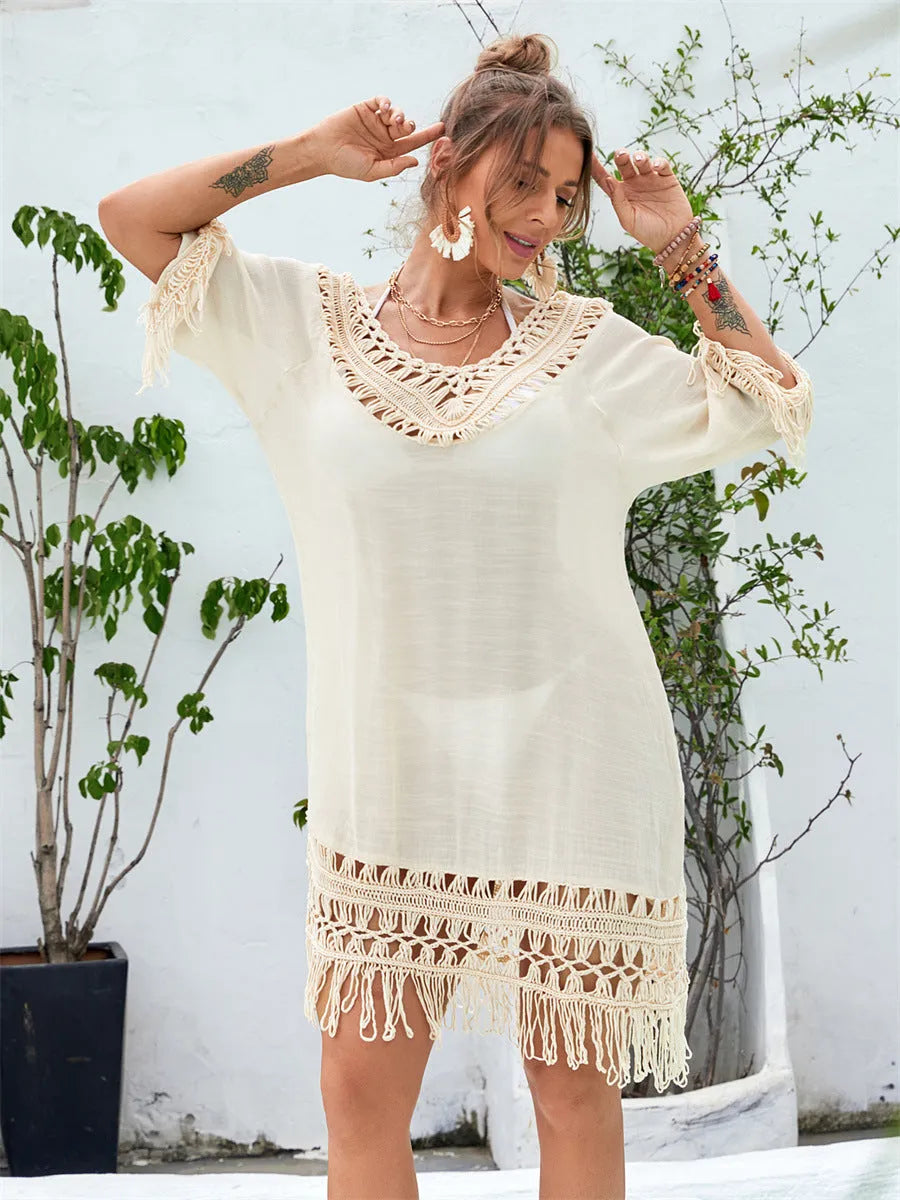 Apricot-coloured hand-crocheted beach dress with a solid design.
