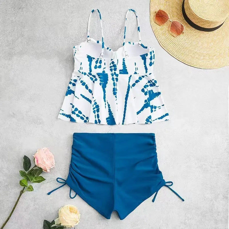 Women's hard bag printed split bikini swimsuit set in blue colour.