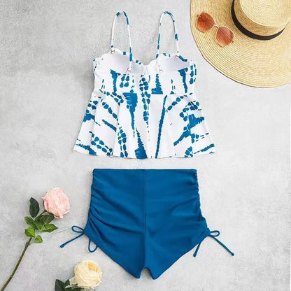 Women's hard bag printed split bikini swimsuit set in blue colour.