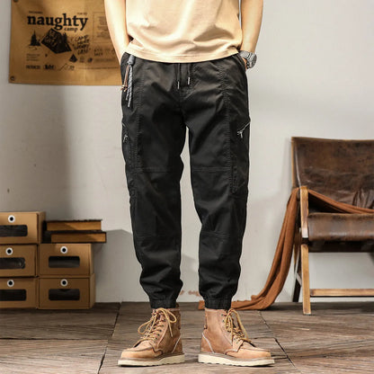 Men's tapered ankle harem trousers in cotton fabric with mid-waist fit
