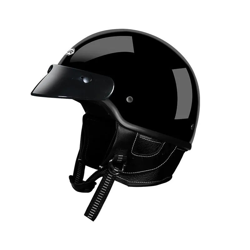 Retro full-face motorcycle helmet on a plain background, shown in cement grey colour.