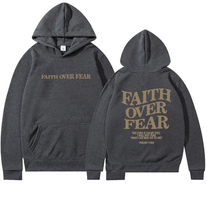 A stylish Christian hoodie with inspirational graphics and a message of faith over fear