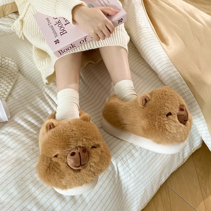 Light brown women's winter slippers with cartoon pattern, plush upper, and thick PVC sole