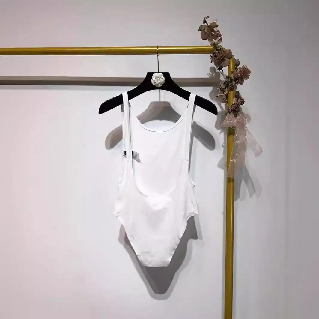 Backless sling jumpsuit for women, slim fit polyester, short 40cm length, black white khaki orange, sizes S M L