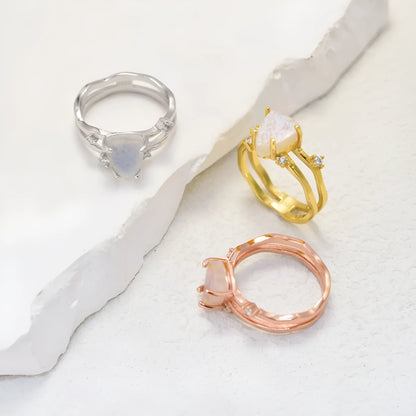 S925 sterling silver irregular triangle moonstone ring showing geometric design and 12mm gemstone centrepiece