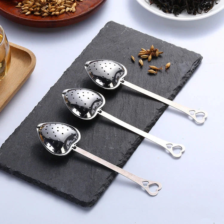 Premium stainless steel tea infuser with heart-shaped design, suitable for brewing loose-leaf teas, herbs, and spices