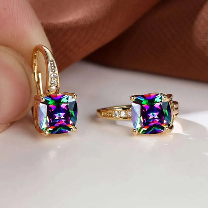 Square geometric ear clips with colourful moissanite inlays and a metallic electroplated finish.