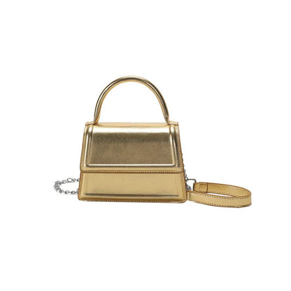 Retro style square PU leather crossbody bag in multiple colours on a model.