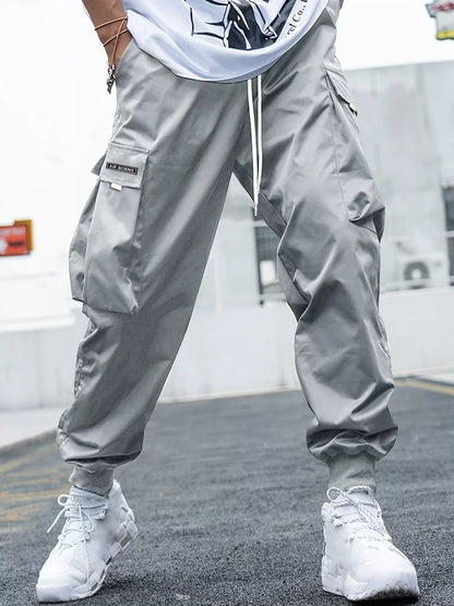 Men's oversized cargo pants in various colors with multiple pockets