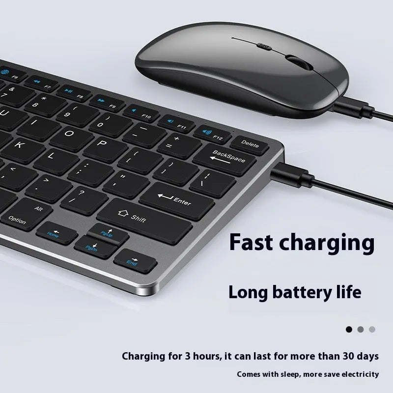 Black ultra-thin wireless keyboard and mouse combo with USB receiver and keyboard cover on a desk.