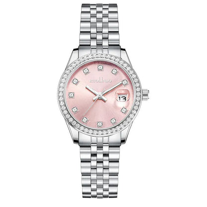 Women's silver alloy calendar watch with quartz movement and stainless steel buckle on wrist.