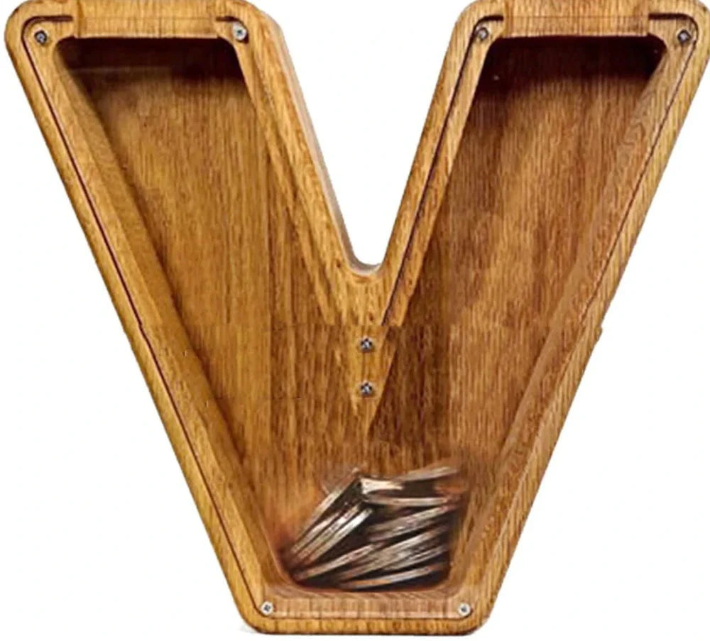 Handmade wooden letter piggy bank with personalised initial, showing 15cm height and 5cm coin slot for UK coins