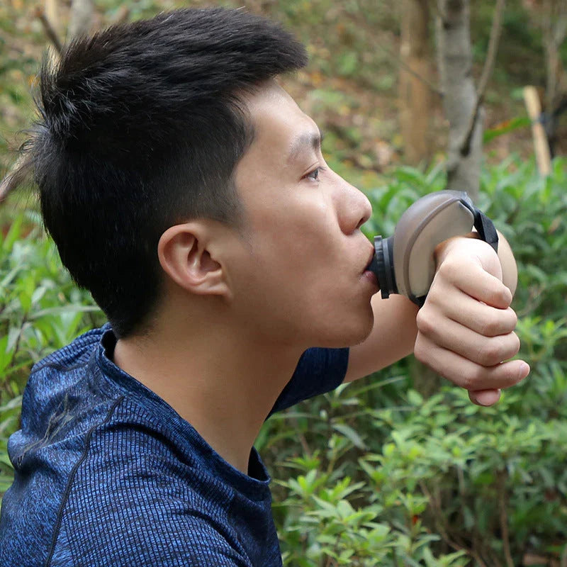 Hands-free sports water bottle with silicone mouthpiece and wrist strap for cycling, running, and other fitness activities