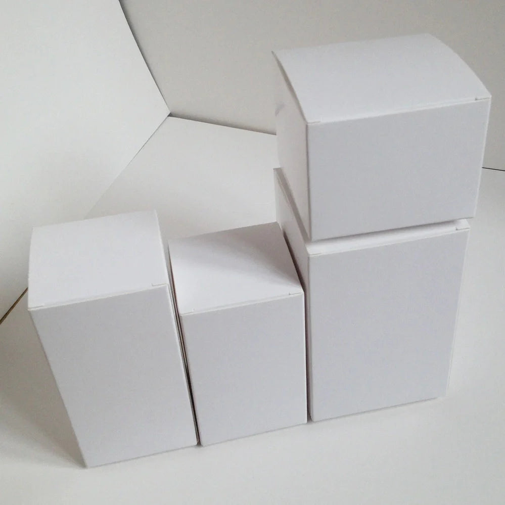 White paper storage boxes showing size variations from 3x3cm to 10x10cm base with different height options