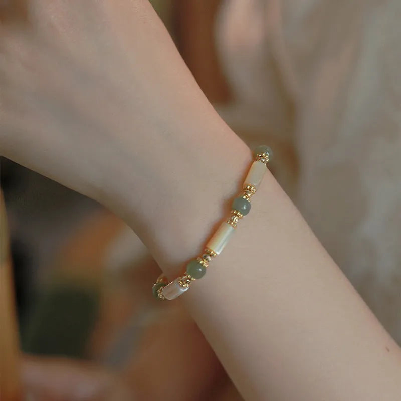 Women's Hetian Jade white lip shell bracelet with geometric round beads