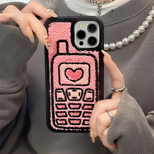 Pink soft TPU iPhone case with a towel-embroidered textured back for models iPhone X to 15.