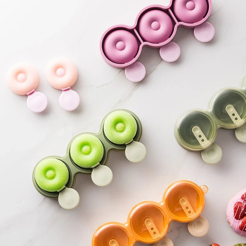 Food grade silicone doughnut ice cream mold in yellow, green, and purple