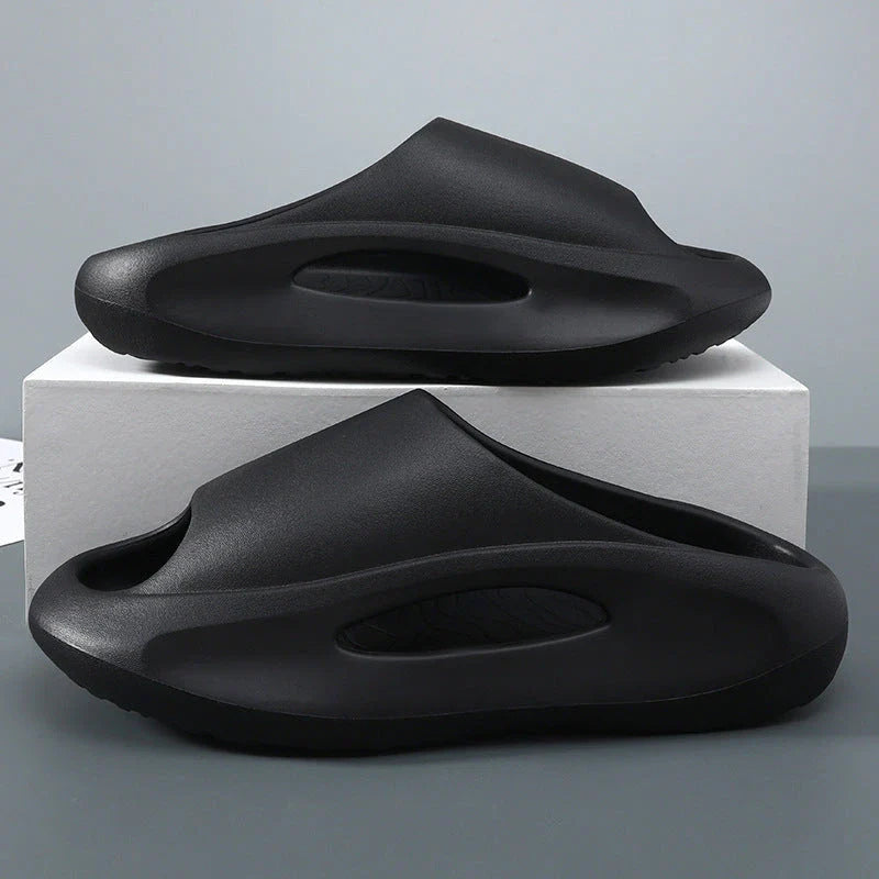 Stylish and comfortable unisex slippers with a unique hollow design, perfect for summer beach and casual wear