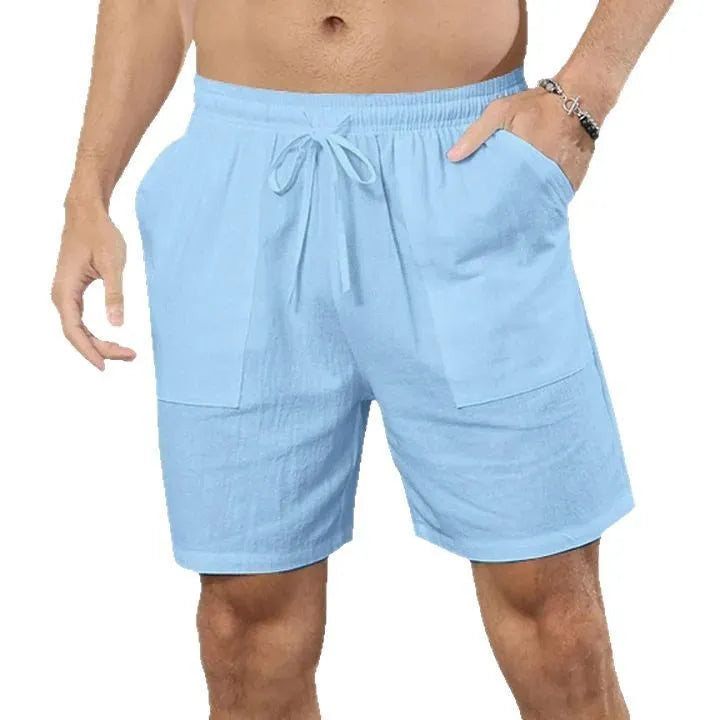 Men's straight leg linen shorts in light blue on a plain background