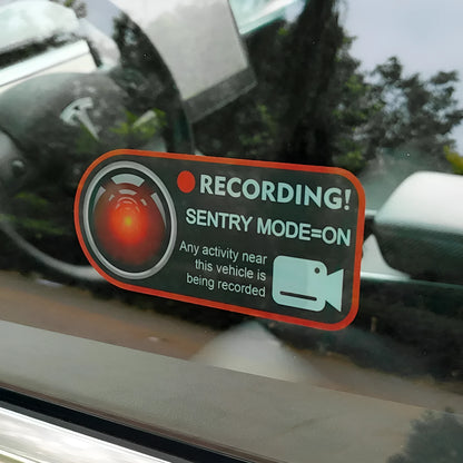 Tesla Sentry Mode electrostatic warning sticker measuring 11cm by 5cm with English security text