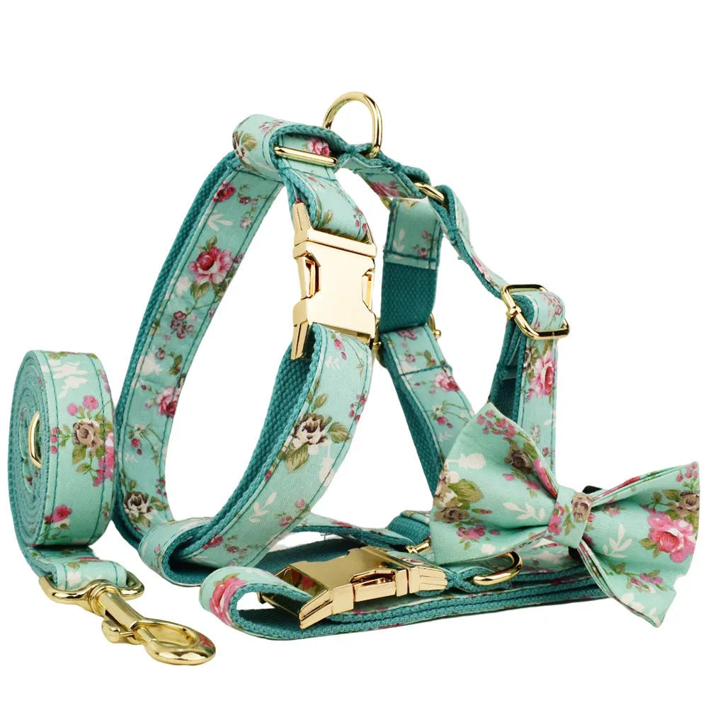 Fabric dog collar and leash set with detachable rose bow in green background
