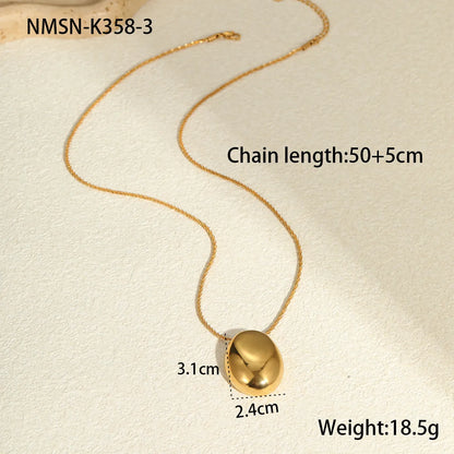 Gold-toned geometric pendant necklace on a chain, showing adjustable length between 41 cm and 50 cm.