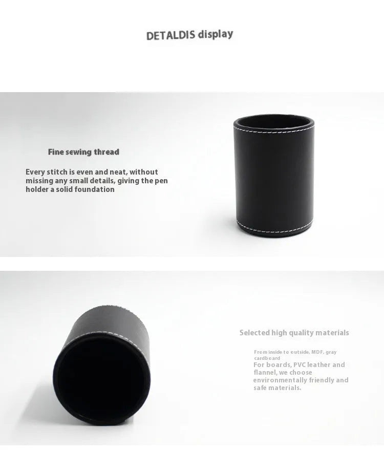Round black leather pen container measuring 8.0cm diameter by 10.8cm height on wooden desk