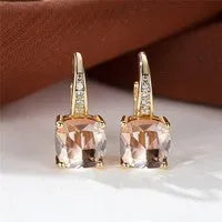 Square zircon inlaid ear hook earrings with geometric design and electroplated finish in golden tone