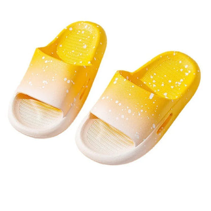 Gradient blue PVC slipper for children on a white background, showing non-slip sole.