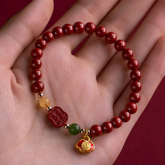 Emperor Sandstone bracelet with fu character, available in 6mm or 8mm cinnabar beads.