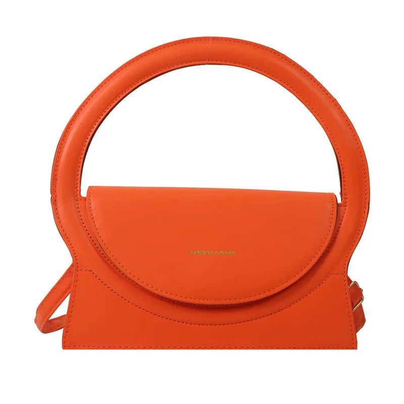 Simple square messenger bag in PU leather with a shoulder strap, shown in various colours.