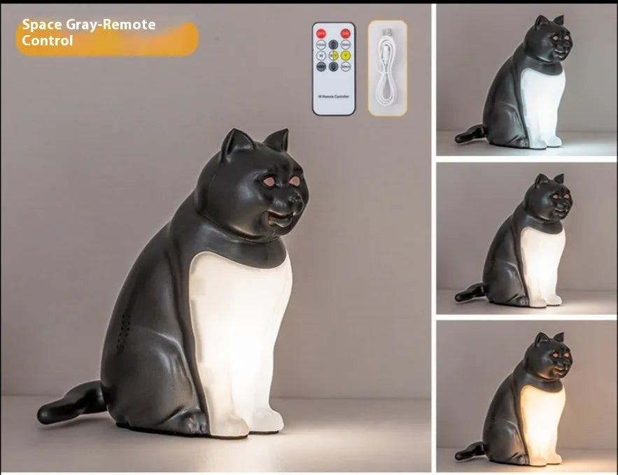 Cat-shaped USB rechargeable table lamp with adjustable colour temperature on wooden desk