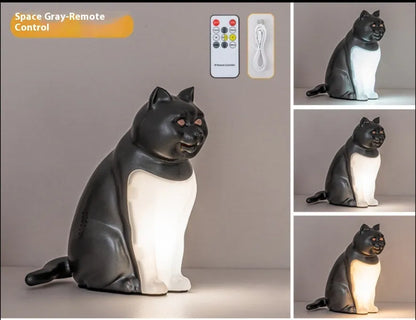 Cat-shaped USB rechargeable table lamp with adjustable colour temperature on wooden desk