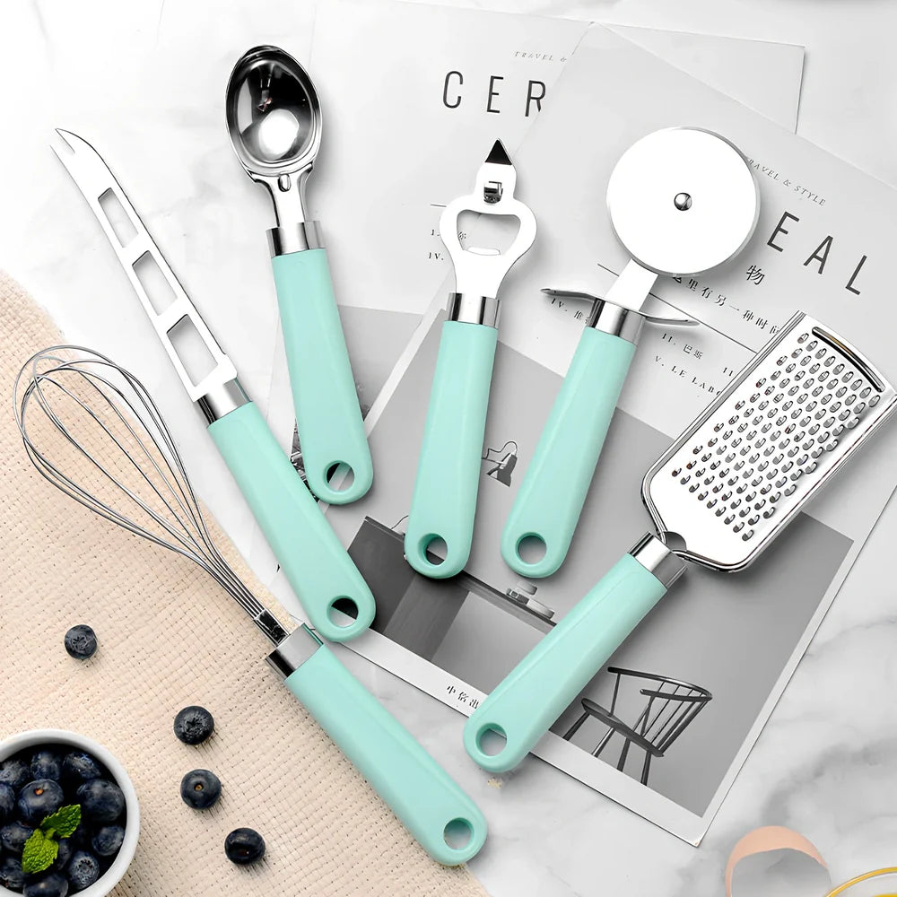 9-piece stainless steel kitchen utensils with black plastic handles arranged for food preparation