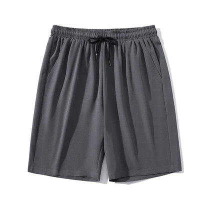 Men's cropped sports pants in quick-drying nylon with straight fit and elastic waistband
