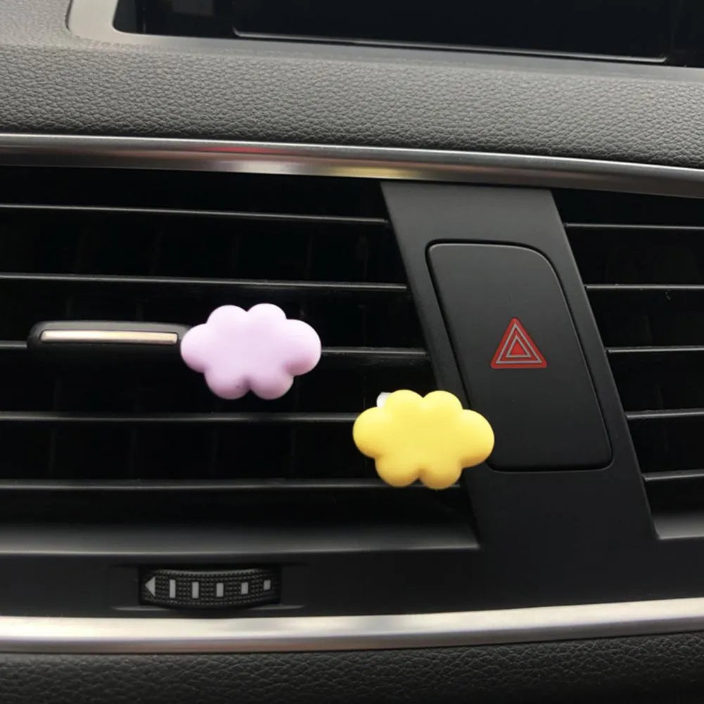 Resin car fragrance clip in light green colour showing 17mm x 27mm dimensions on car air vent