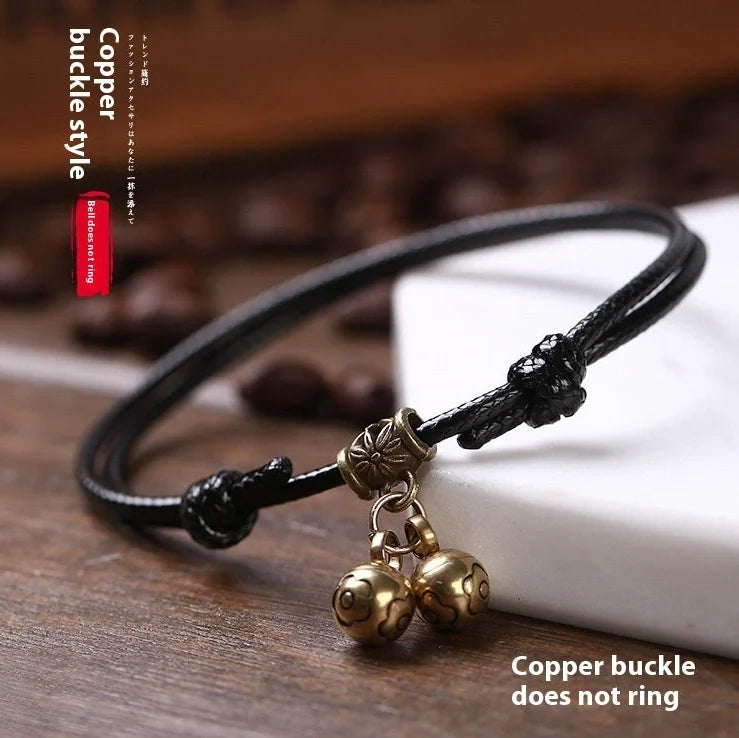 Adjustable nylon rope dog collar with brass bell in black, red, and coffee colour options