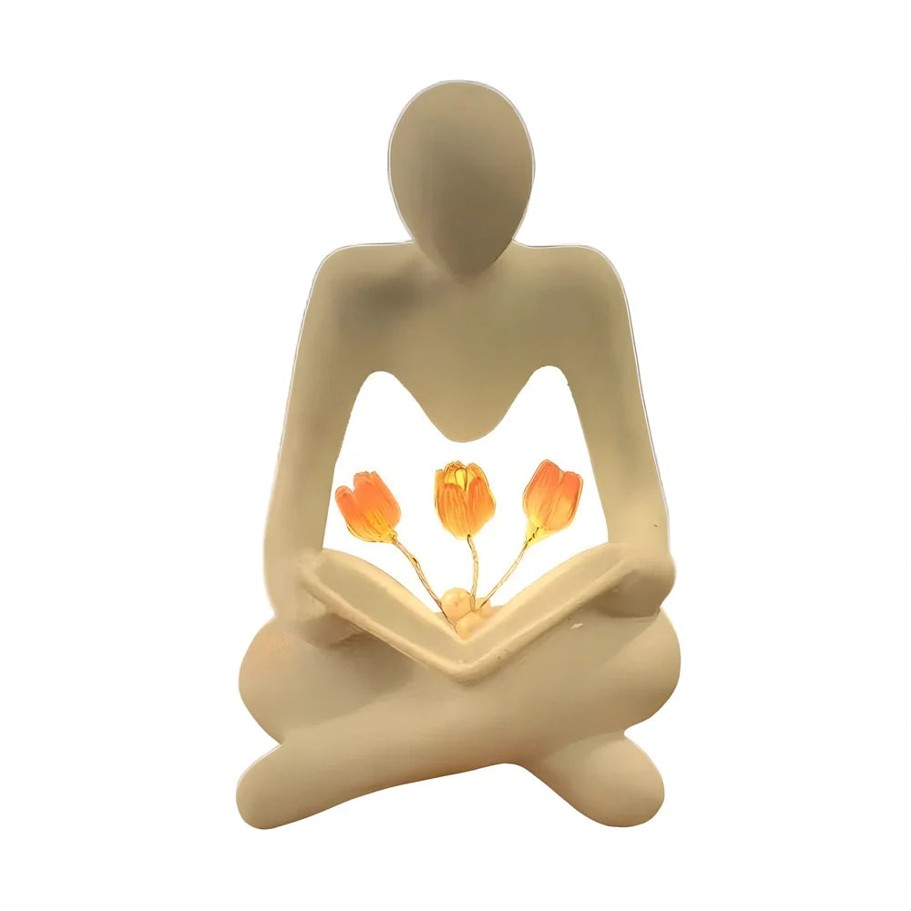 Nordic abstract thinker statue with tulip book night lamp measuring 7x6.3x11.5cm