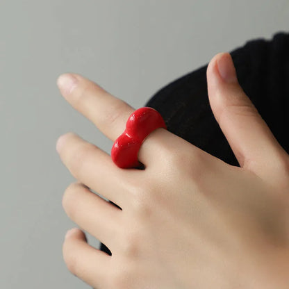 Heart-shaped enamel ring with three-dimensional detail in black, pink, purple, or red, sized for fingers 17-18