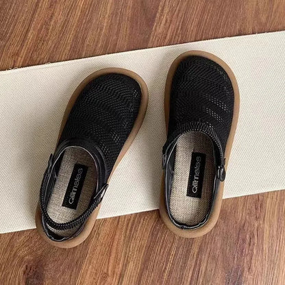Women's beige linen slip-on shoes with mesh lining and a soft rubber sole.