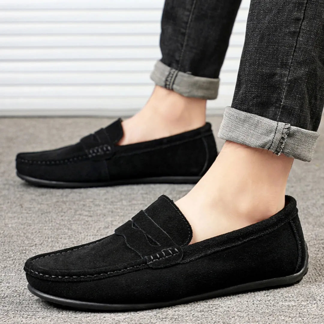 Men's suede loafers in black, blue, dark blue, wine red, and yellow colours with round toe and slip-on design.