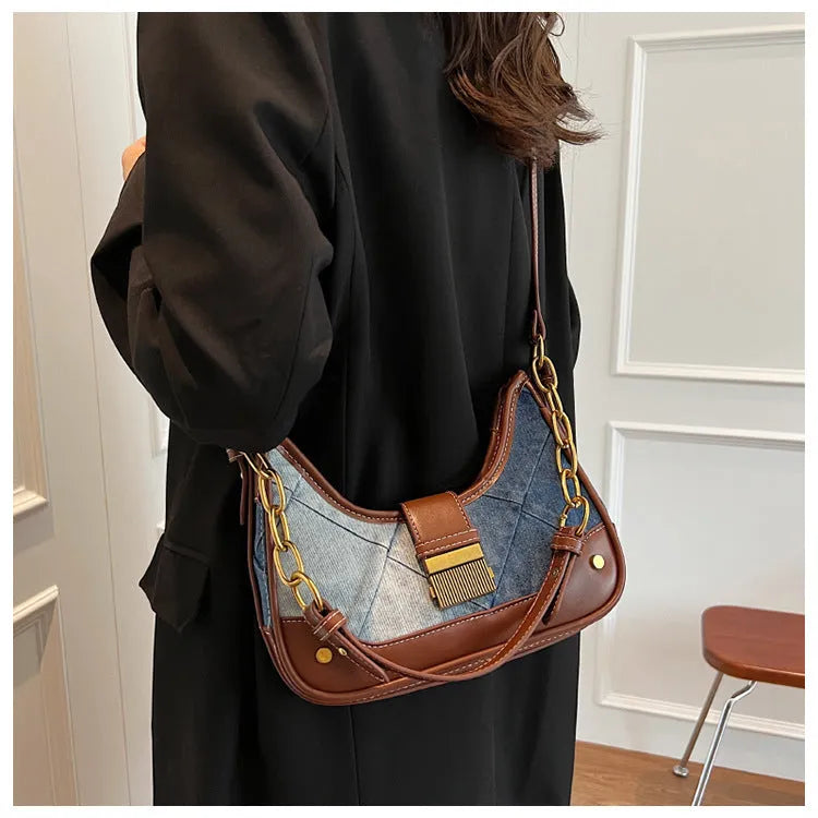 Brown denim women's bucket shoulder bag with diamond mesh detail and chain straps