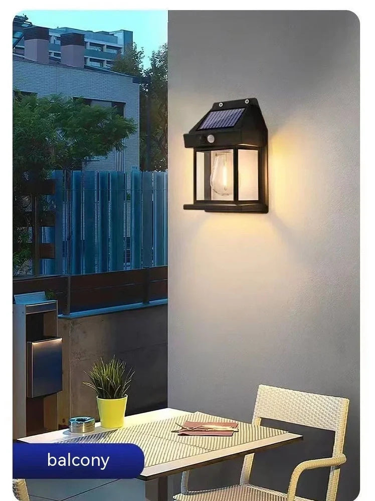 Black solar garden wall lamp with waterproof IP65 rating and automatic light sensor for outdoor installation