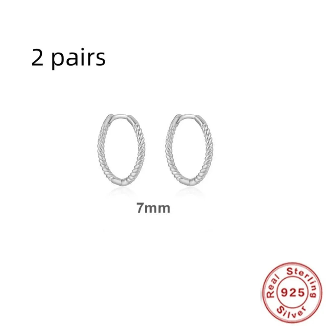 Sterling silver twisted string round ring earrings in gold or platinum colour.