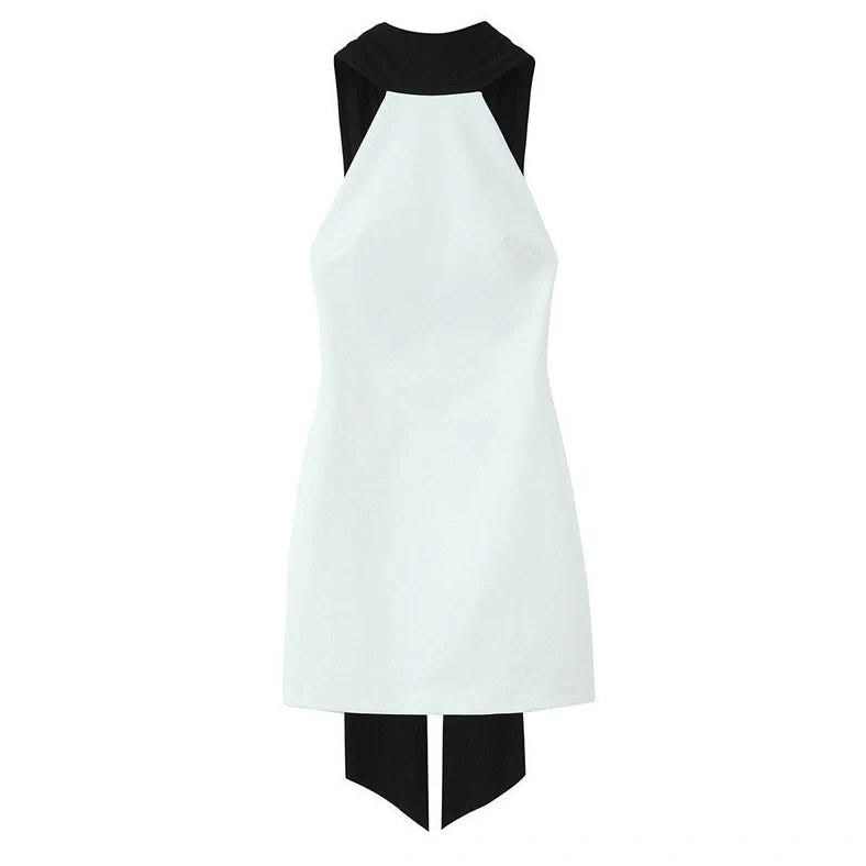 Slim-fitting patchwork short halter dress with asymmetric skirt design in black or white, available in sizes XS to L, featuring a high waist for a flattering silhouette and long skirt length for versatile styling.