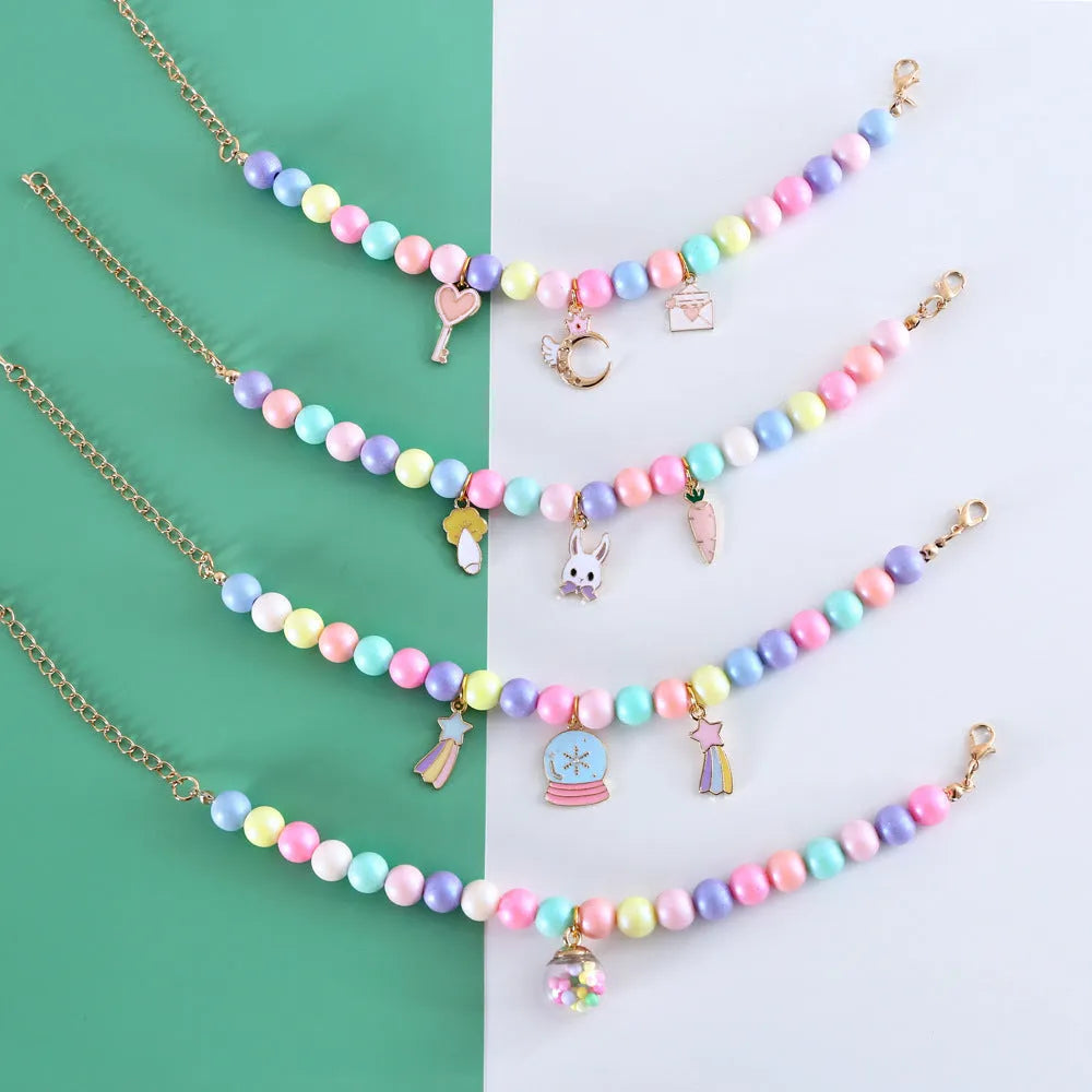 Adjustable resin pet collar with macaron designs in six colours, showing sizing from 15-38cm