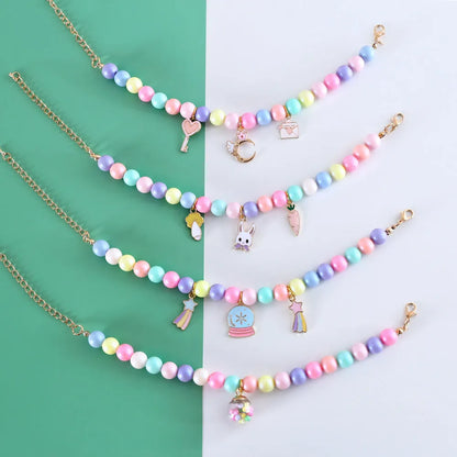 Adjustable resin pet collar with macaron designs in six colours, showing sizing from 15-38cm